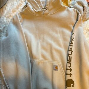 Men’s carhartt hoodie size medium. Off white/cream colored with brown writing.